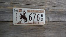 1982 Wyoming Cowboy Bucking Horse with rustic fence excellent Condition1978 base picture