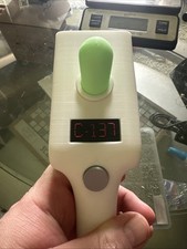 Rick and Morty Portal Gun With Glow in the Dark Vial picture