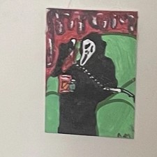 Ghost Face Scary Movie Character Holding Telephone With Doritos And Monster picture