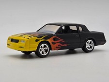 2010 Johnny Lightning 1987 Chevrolet Monte Carlo SS Black Flames Loose 1:64 picture