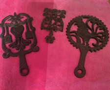 3 Vintage Black Cast Iron Trivets Rooster, Cupids & Broom Country Cottagecore picture