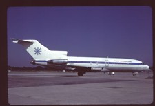 Orig 35mm airline slide Flight International Airlines 727-35F N150FN picture