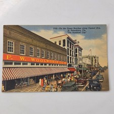Vintage F. W. Woolworth Co. St. Petersburg, FL Green Benches Postcard picture