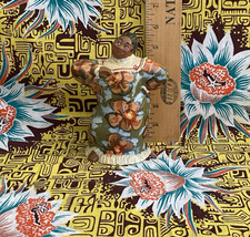 Hawaiian Andrea of Kona clay painted womam with beautiful flower dress picture