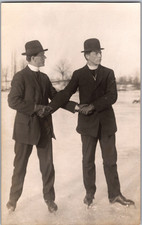 RPPC Two Priests Clergymen Shaking Hands Bowler Hats Antique Photo Postcard 1910 picture