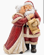 Santa & Mrs. Claus Kissing/Hugging Figurine Resin Painted Multicolor 5.9in picture