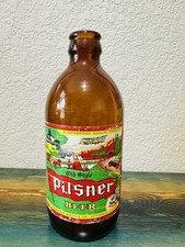 1957 Sick’s Lethbridge Brewery Old Style Pilsner Amber Stubby Beer Bottle picture