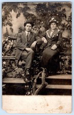 1907-1920's RPPC MAN & WOMAN CITY PARK STUDIO WASHINGTON STREET PHOTO POSTCARD picture