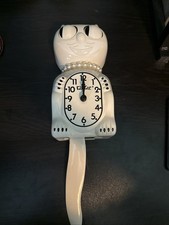 White Kit Cat Klock With Classic Pearl Necklace  picture