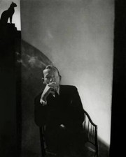 Noel Coward seated in a chair designed by Syrie Maugham smoking 1930s Old Photo picture