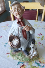 VTG. LEFTON CREATION CERAMIC FIGURINE 'POSTMAN AND HIS HOUND'' made in Japan picture