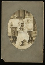 antique family portrait with cute little dog & boy holding fiddle 1900s photo picture