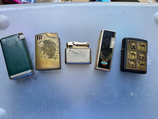 Lot of 5 Vintage Cigarette Lighters Zippo Camel/Harley, Parker, Reister, Vulcan picture