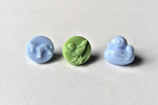 Lot of three small vintage milk glass kiddie buttons, donkey, chick, duck - 1/2