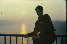c1980's Kodachrome 35mm Slide Man Portrait River Sunset Hazy Landscape Stone picture