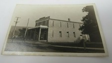 Unidentified Town Street Scene Brick Building RPPC Real Photo Postcard c1910s picture