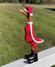 Handcrafted wooden christmas duck sculpture goose with red coat and boots picture