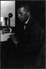 Photo:Booker T Washington 1900s Portrait at Desk Signing picture