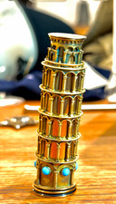 Leaning Tower of Pisa lipstick case (c.1950). Gold plated and available in 1962 picture