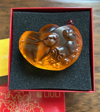 Liuli Gongfang Living Crystal Lucky Rabbits display East West bank collaboration picture
