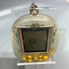 Vintage BANDAI NAMCO PAC-JUNIOR Keychain Handheld LCD Game 1996 Clear Yellow See picture