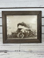 Angles Camp 19th-century steam tractor and agricultural combine in a field picture