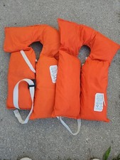 2 Vintage Noble Childs Size U.S. Coast Gaurd App. Life Preserver Vests Orange. picture