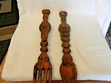 Vintage Brown Carved Wooden Fork and Spoon Wall Art With Carved Faces picture