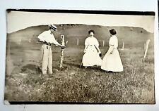Postcard Antique c1908 LADIES and Man with RIFLE SHOTGUN Long Dress REMOTE Area picture