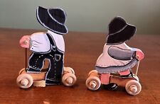Vintage Wooden Amish Boy And Girl On Scooters Figurine Set picture