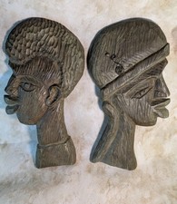 Pair of vintage hand-carved solid wood profile/silhouette wall plaques featuring picture