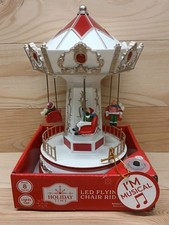 Holiday Time LED Flying Chair Ride Spins Lights Music Plays Christmas Carols NEW picture