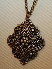 Lovely Sculpted Floral Swirled Brasstone Teardrop Pendant Necklace picture