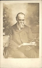 Older bearded man reading Studio Fine Photography c1910 Real Photo Postcard bhn picture