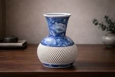 Japanese Hasami Yaki vase with blue floral and openwork lattice design. 11