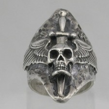 Winged skull with dagger through head silver ring picture