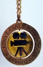 Universal Studios Florida Keychain in Gold Tone with Filming Reel Spins Center picture