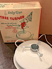 eBay Listing – Vintage Holly Time Revolving Christmas Tree Stand with Original picture