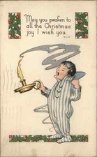 Christmas Yawning Little Boy with Candle c1910 Vintage Postcard picture