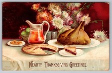 Antique Postcard Embossed Thanksgiving Greetings Feast on Table Turkey Pie picture