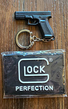 Glock Pistol Keychain And Glock Patch picture