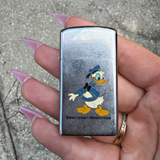 Zippo Donald Duck Walt Disney Productions Flip-Top Pocket Lighter picture