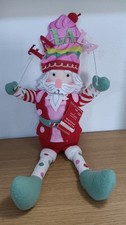 Ashland New Christmas Sprinkle Shop Sitting Nutcracker Plush picture
