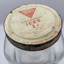 Vintage Tom's Peanuts Co. 1 CENT Cocoanut Huts Candy Jar With Lid. picture