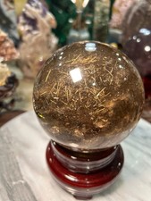 Golden rutile Smoky quartz  sphere  on wood stand 4” Big picture