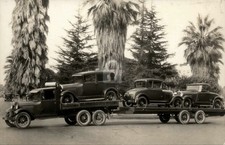 Truck Delivering Ford Trucks to Dealership RPPC Photo Postcard COPY picture