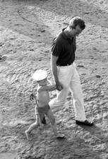 Prince Albert and with son Prince Philippe on a beach Historic 1960s Old Photo picture