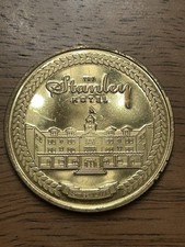 The Stanley Hotel Coin Celebrating 110 Years, Since 1909, Model Z Mountain Wagon picture
