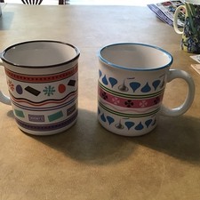 Two Hershey’s Coffee Mugs By Galerie. Featuring Hershey Kisses And Miniatures. picture