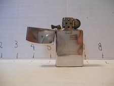 VTG Zippo Lighter Pat no. 2517191 -6 Hole Chrome ,works ,used Mini Pocket Size picture